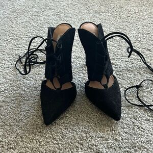Steve Madden black heels with lace that wrap around the ankle